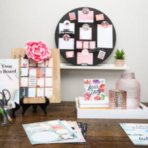 pink art accessories in lifestyle photo shoot with pink glass jar and boss lady sign