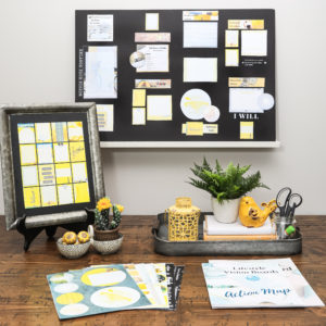 lifestyle photo shoot with yellow rectangle dream board on white shelf and accompanying graphics