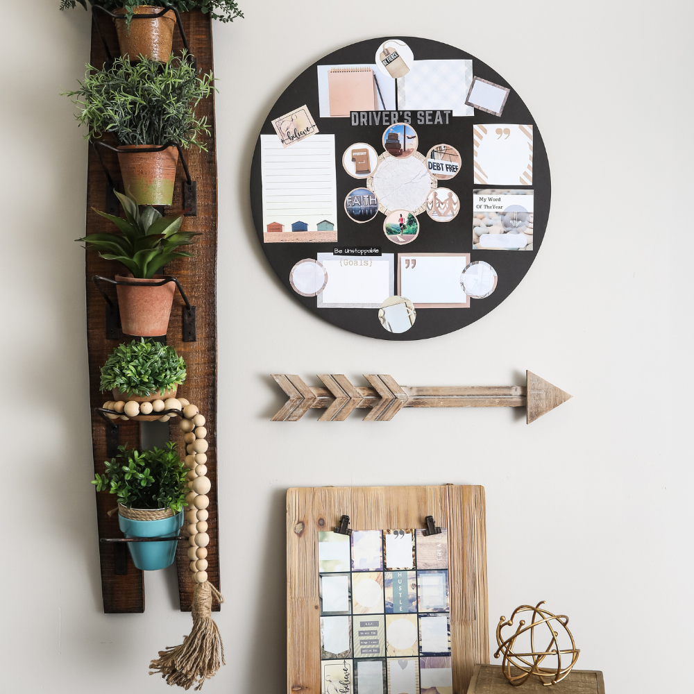 example of a finished vision board display hanging on the wall with brown themed decor